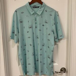Travis Mathew Light Blue Polo with Cactus Pattern